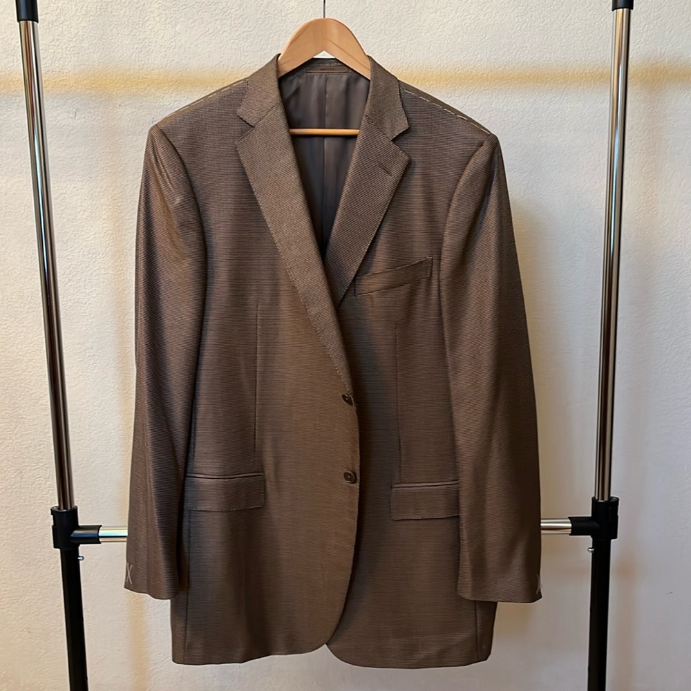 An Ermenegildo Zegna Sports Jacket. New with tags. Size 46L. Brownish color.